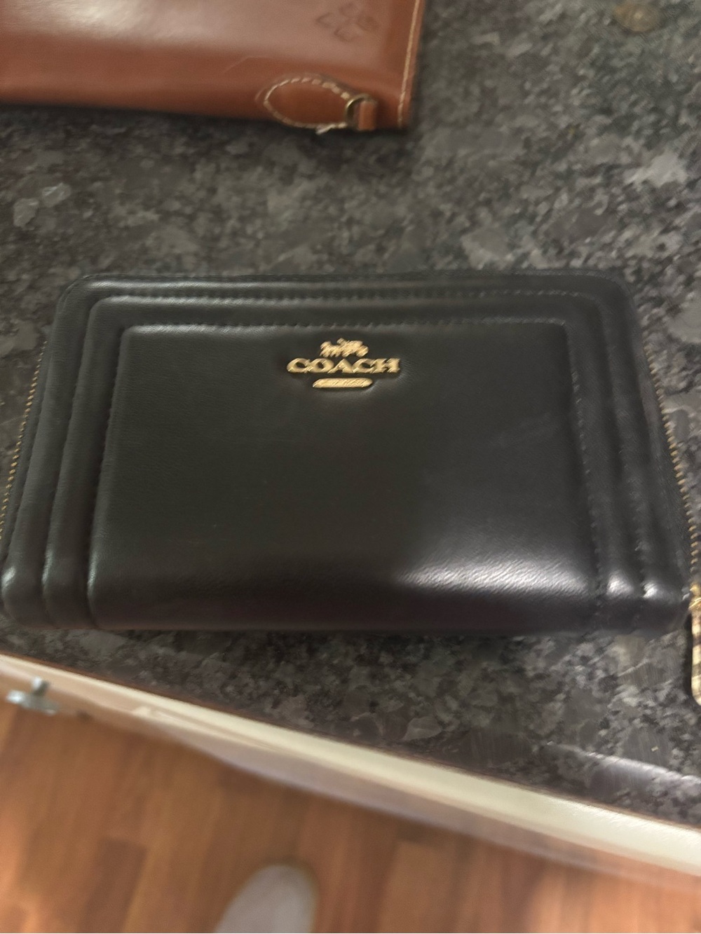 Coach Black Leather Zip-Around Wallet with Gold Logo